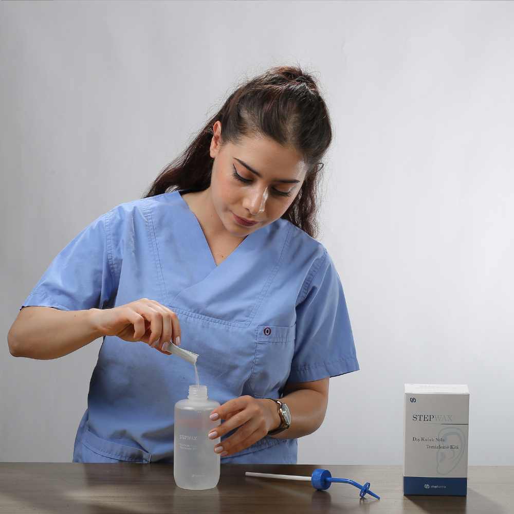 Aşama 3: Saşeyi şişeye boşaltma